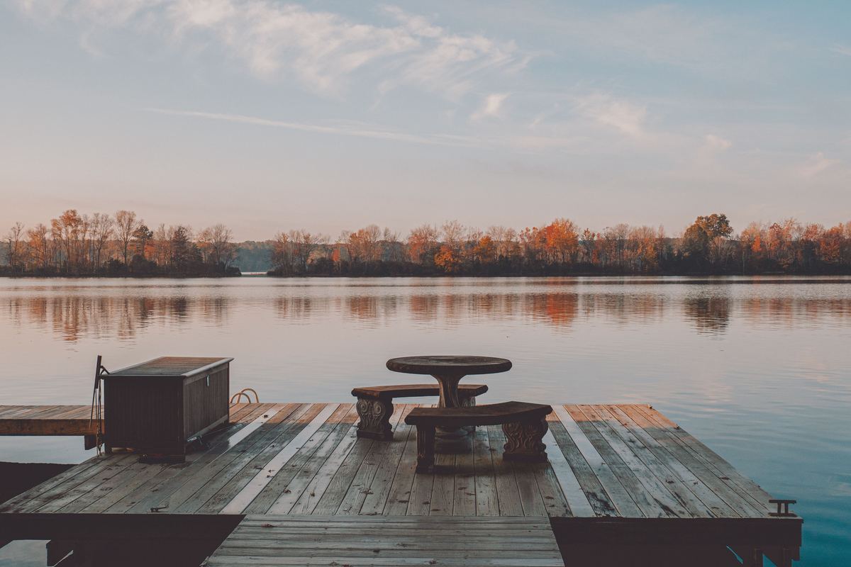 Dock at sunrise on a Carolina lake in autumn